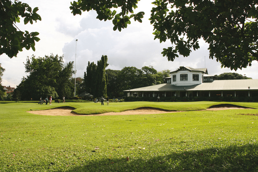 Golfer near clubhouse