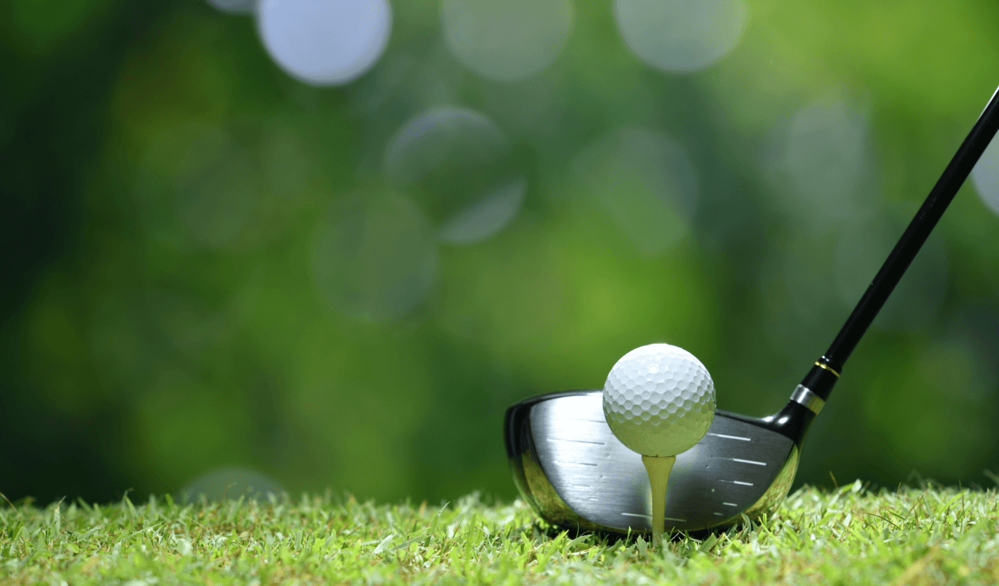 Golfer swinging on a beautiful golf course